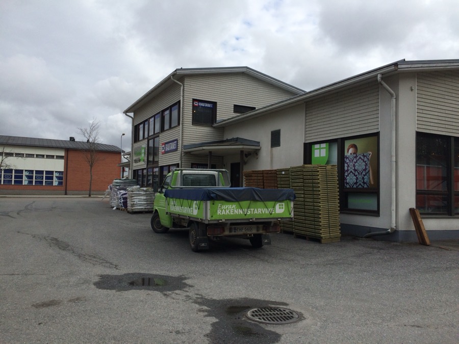 A Rakennustarvike hardware store with its delivery truck outside
